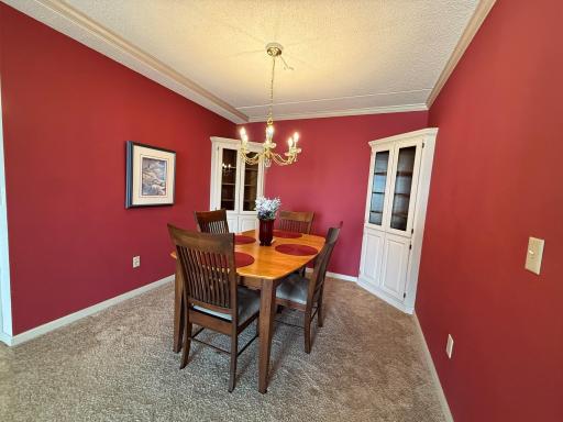2601 Kenzie Terrace 528 formal dining with custom corner built-in cabinets to display your collectibles.