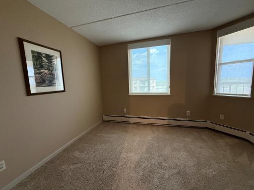This area makes for a perfect office/sitting area with dual windows. Baseboard Heat in the winter is included with your monthly HOA fee.