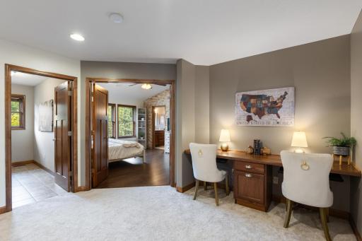 loft workspace and entrance to the primary suite