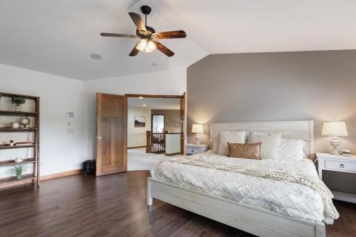 large primary with beautiful floors