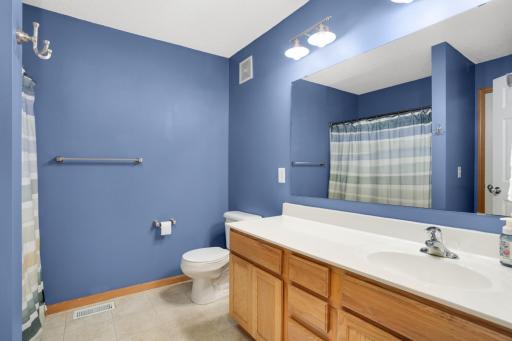 Upper level bathroom is nicely sized to accommodate both upper level bathrooms and is conveniently located just off the primary bedroom.