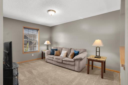 Second level loft offers great flexible space - upper level family room, work from home space, or easily convert to a third bedroom if desired