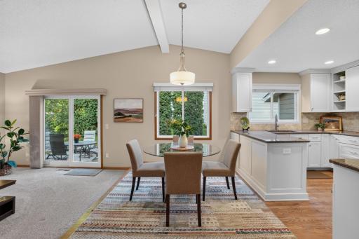 Hardwood floors in front entryway, kitchen and dining room
