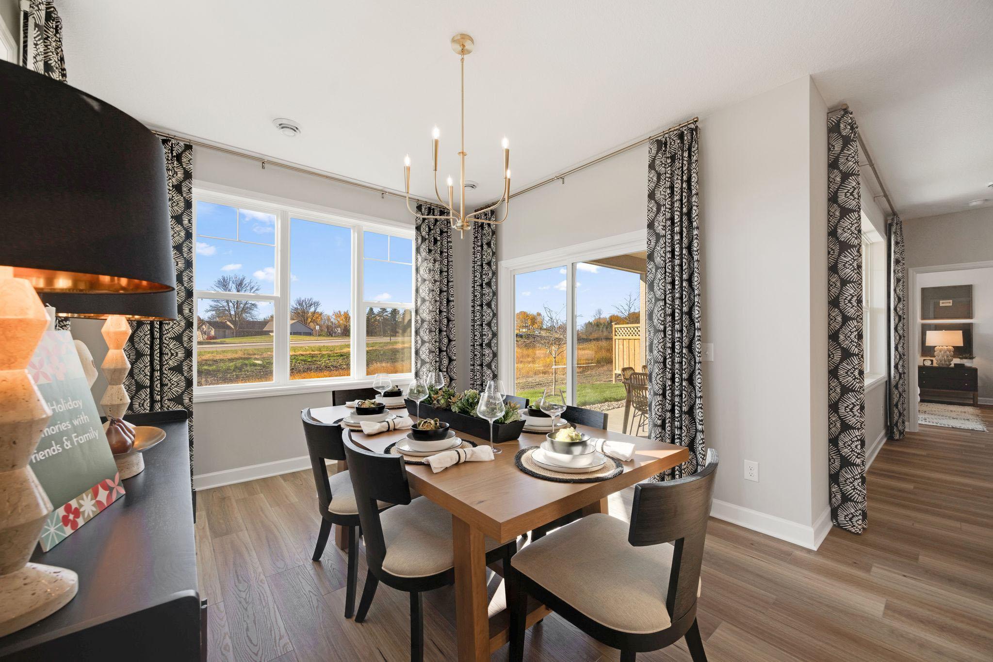 Sliding door near dining area leads to your covered patio!