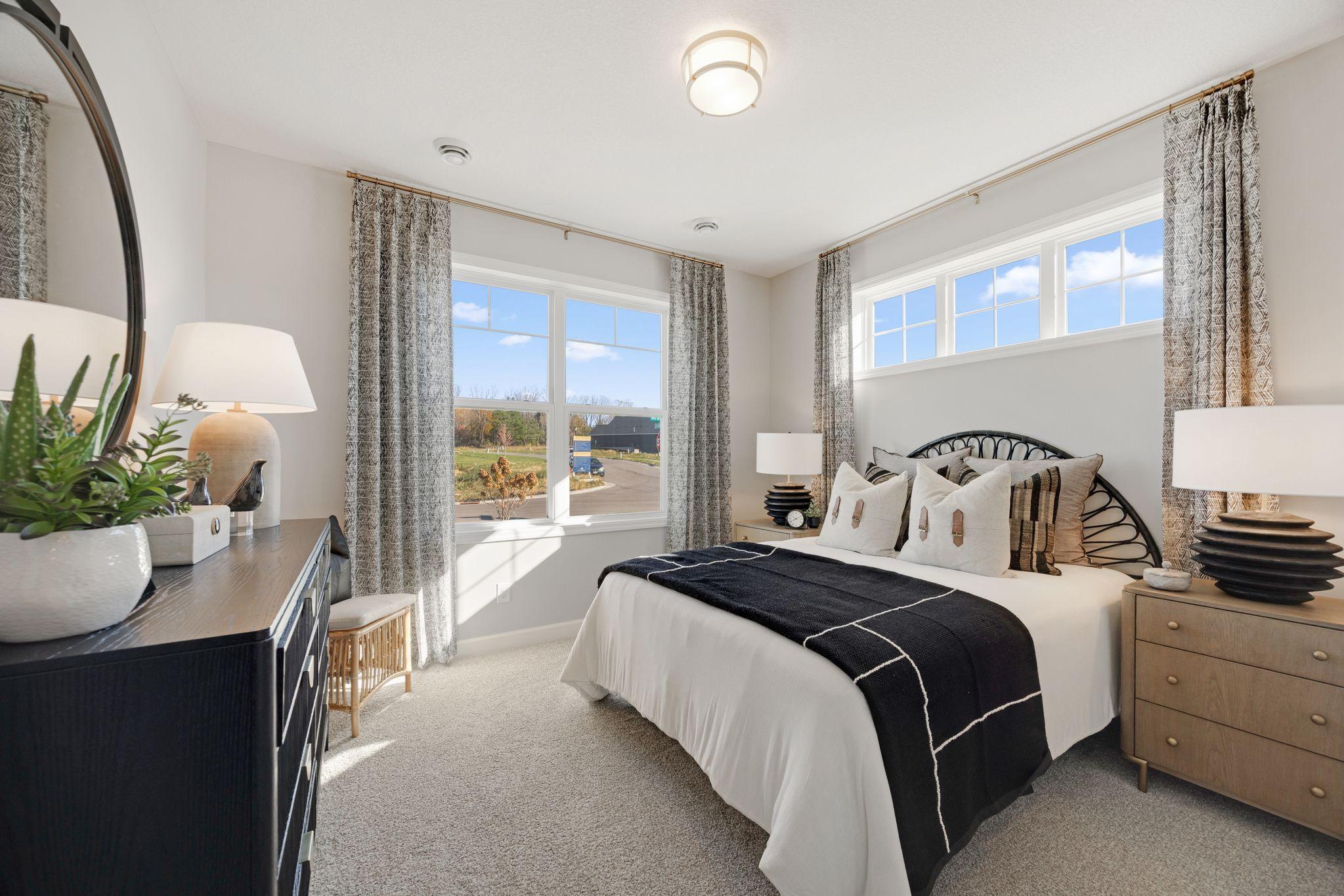 One of two secondary bedrooms