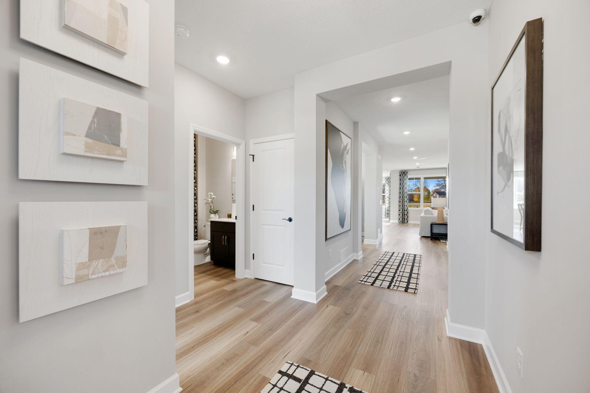 Spacious entry into the home! The two secondary bedrooms and bathroom are toward the front of the home, separate from the owner's suite.