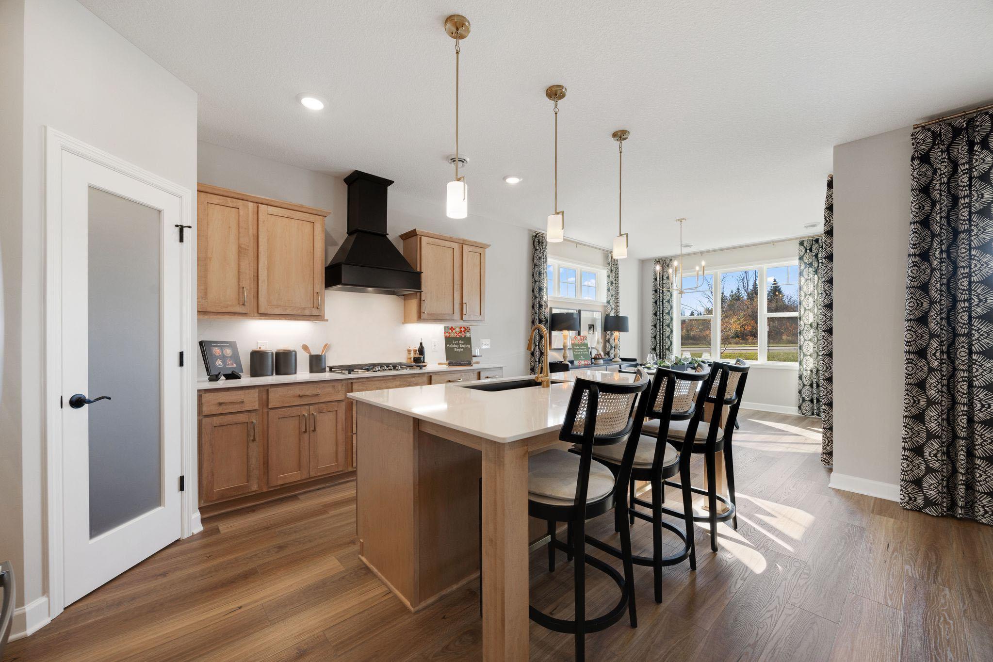 Kitchen features a corner pantry perfect for storing appliances and essentials.