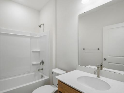 Secondary bath at the front of the home, perfect for guests!