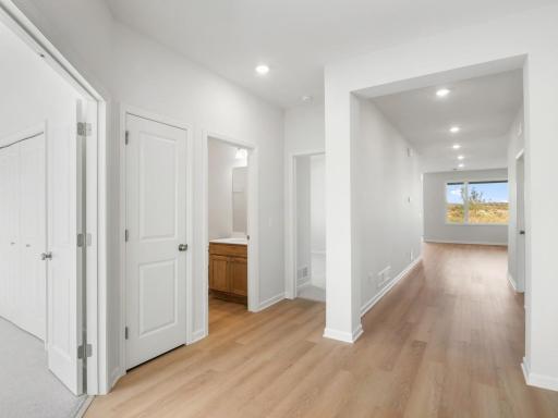 Spacious entry into the home! The two secondary bedrooms and bathroom are toward the front of the home, separate from the owner's suite.
