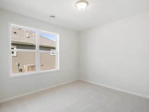 Second bedroom, located in the middle of the home