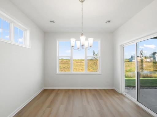 Dining room with sliding glass door to your covered patio!
