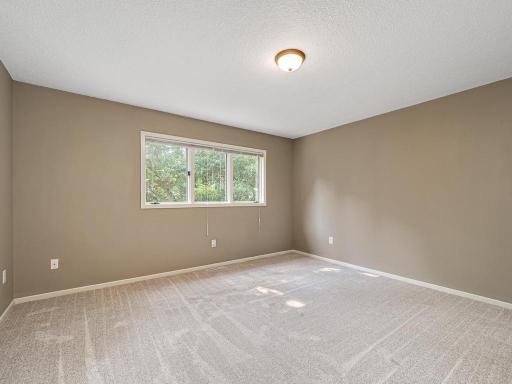 Upper second bedroom with brand new carpet and paint