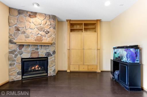 Cozy Gas Fireplace with Rock face and wood mattle to accent the holidays you celebrate together