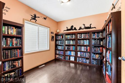 This is the Fourth Bedroom/Office on the first floor. The Bookshelves will be removed and a Wardrobe will be left.