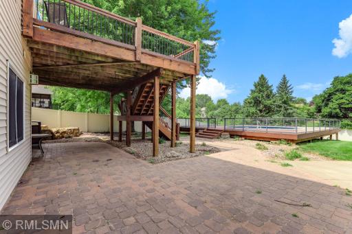 Paver Patio Extended along the back of the home