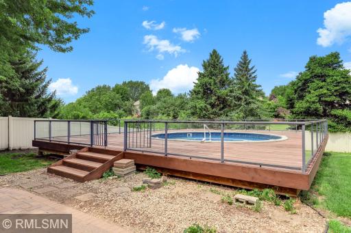Sunbath with privacy fence or cool of in the water.