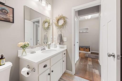 Main level full bathroom off 2nd bedroom and foyer