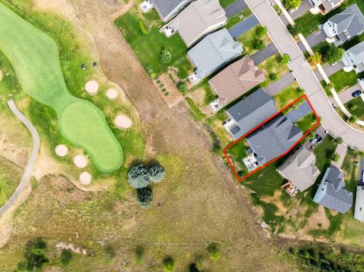 Aerial view of the 5th green and home's location