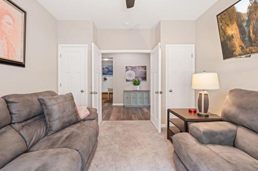 Double doors welcome you to a great space that acts as a flex room, office, TV room or bedroom