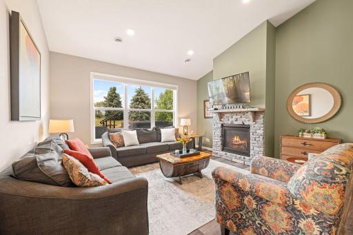 Living room surrounding a beautiful gas fireplace