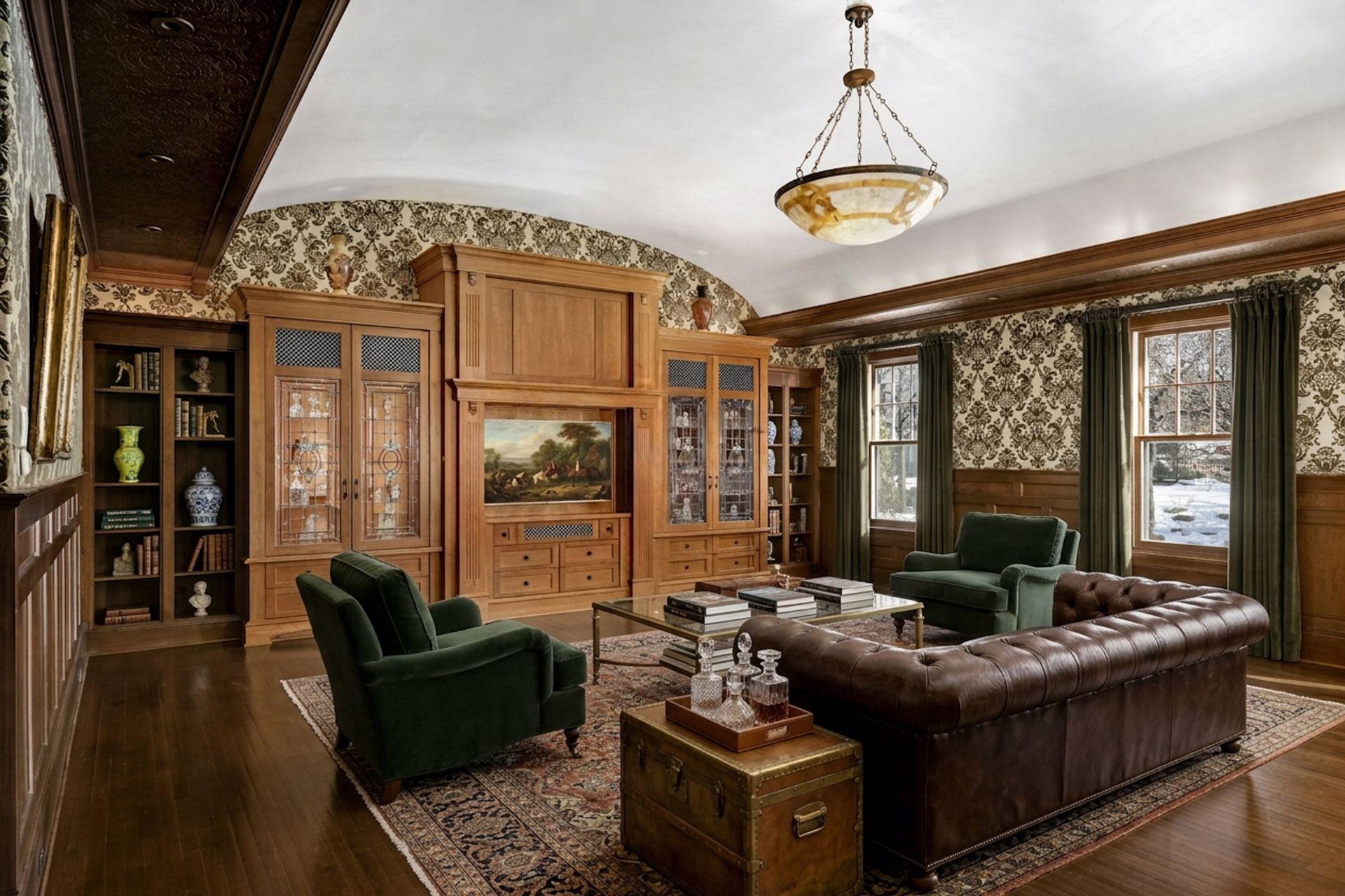 Barrel vaulted mezzanine family room with extensive cabinetry (virtually staged)