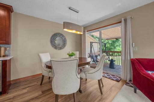 Good sized dining area between kitchen and sliders to large deck and lake views!