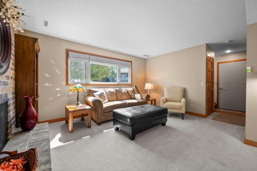 The family room is a cozy space to watch movies, hang out with friends, or have some quiet time.