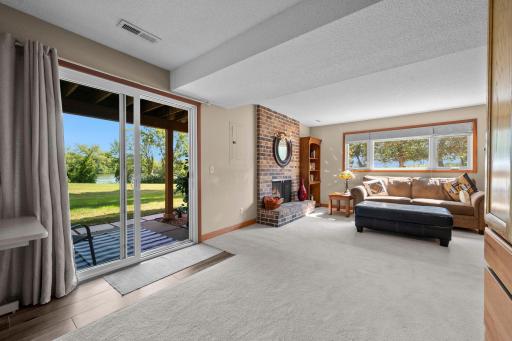 View of the grassy area and the lake from this flex space, which could be a 3rd bedroom.