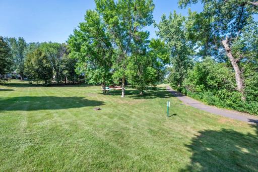 The canoe/kayak storage racks are a short walk from the home down the walking path which goes all around Rice Lake. The HOA offers canoe storage for a fee.