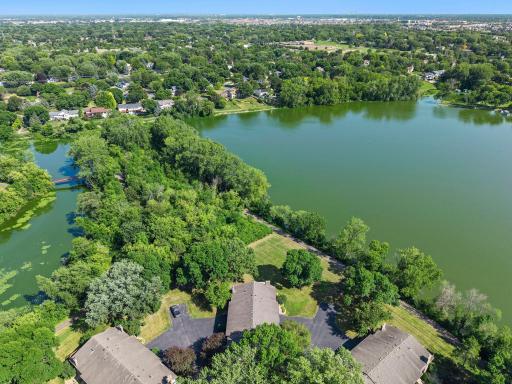 Overhead view of the lake and your home, showing the large grassy area by the house!