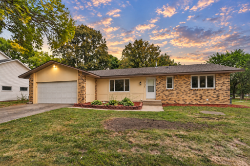 This charming rambler offers great curb appeal with fresh new exterior paint, classic brick accents, mature trees, and an inviting front entry. Conveniently located in an established neighborhood close to parks, schools, shopping, dining, and major r