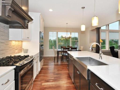 PHOTOS/VIRTUAL TOURS SHOWN ARE OF A PREVIOUS MODEL HOME AND MAY DEPICT OPTIONAL FEATURES, AND FINISHES NOT INCLUDED IN THE BASE PRICE.