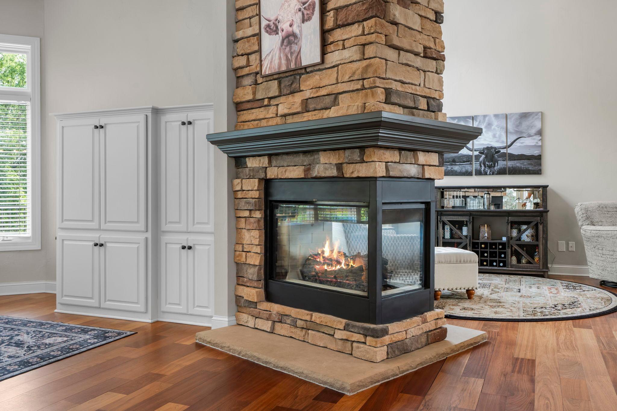 This stone double sided fireplace is a must see