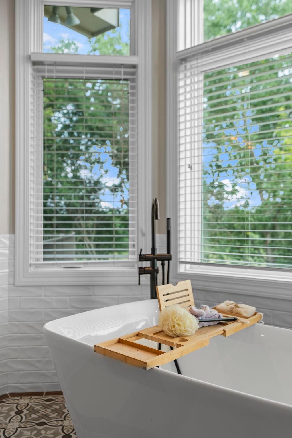 Enjoy a bath overlooking the private backyard