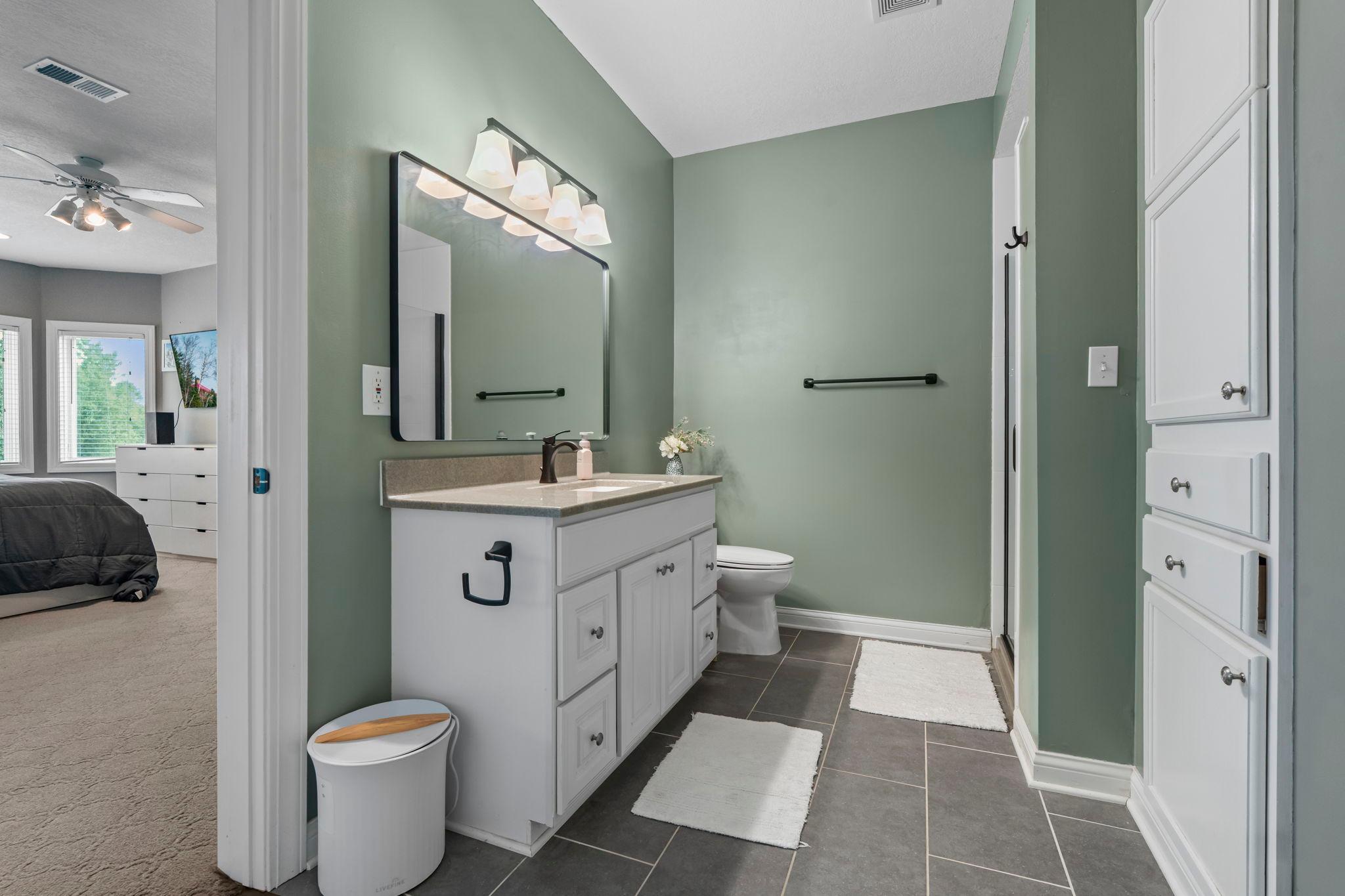 Updated 3/4 bathroom with access from the bedroom