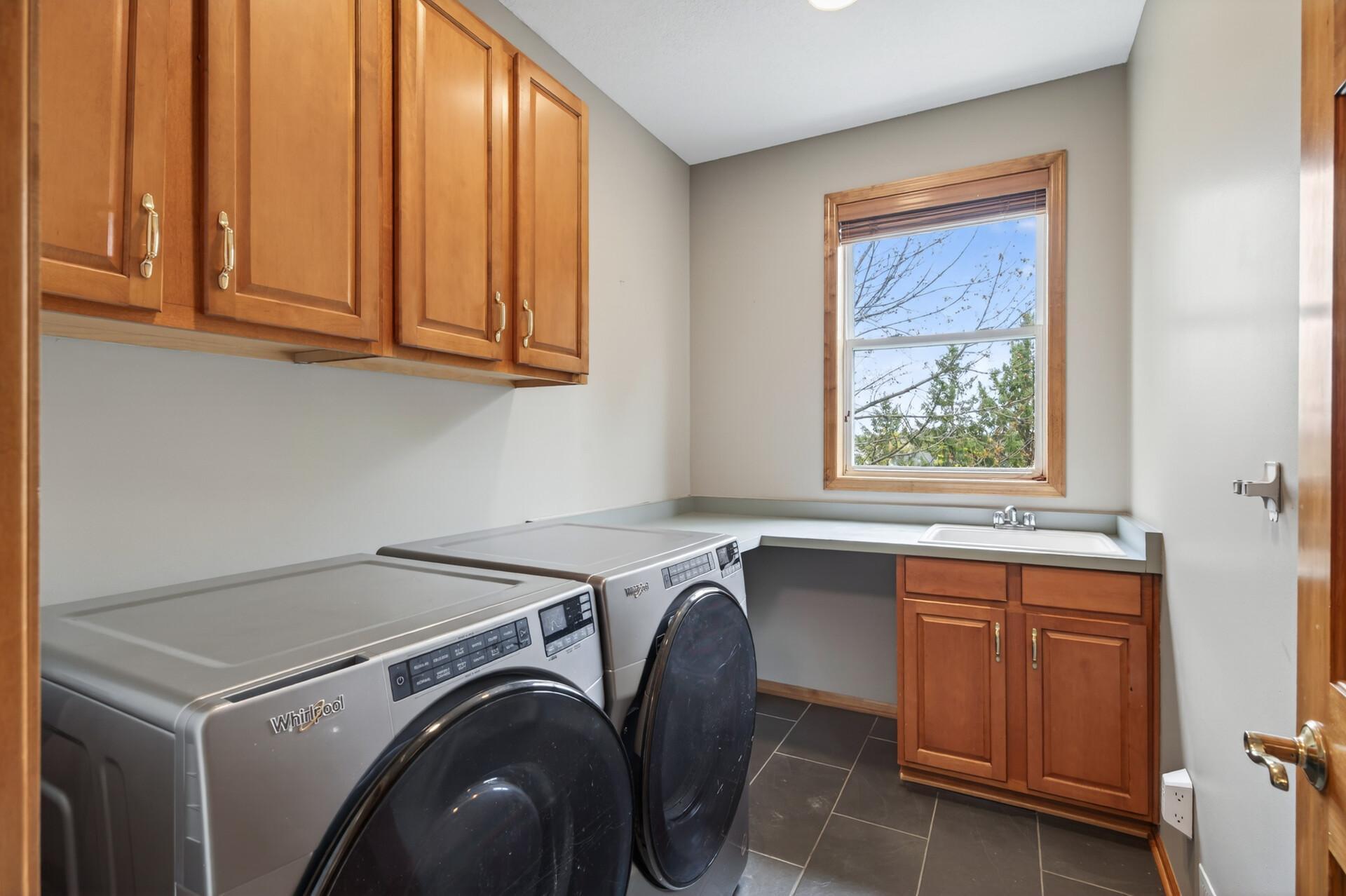 Main level laundry with new washer and dryer
