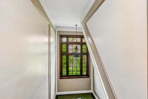 Gorgeous wood & building detail, exercise room, Downtown views from rooftop balcony, sauna & more!