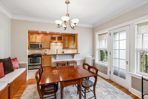 Dining room to breakfast bar & balcony view