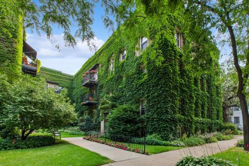 Beautiful East Isles top floor unit with coveted north side of building interior courtyard views