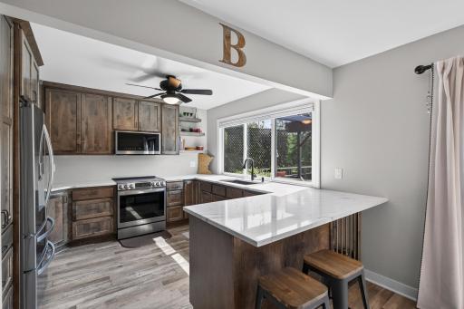 Remodeled Kitchen with quartz and custom cabinetry