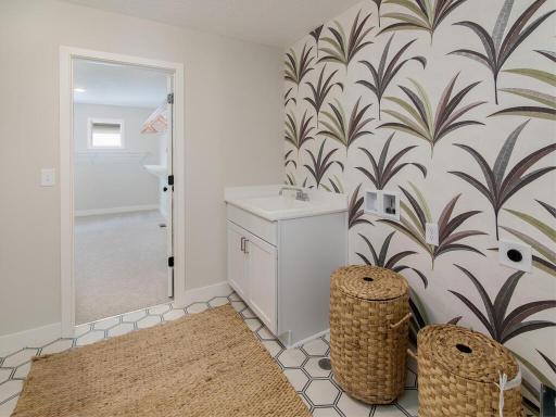 Walk through your owner's closet to the laundry room