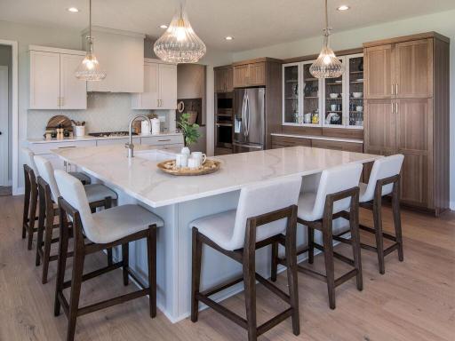Gourmet Kitchen with optional glass cabinets make this kitchen a dream
