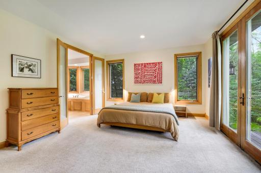 Double doors offer easy access to primary bath