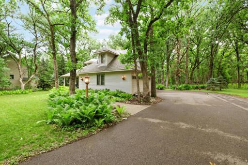 Driveway leads to 3 car garage