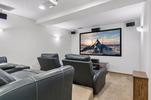 Lower level Media/Theatre Room. The newly furnished theatre style seating is included in the sale.