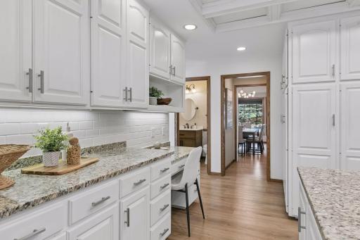 Plenty of pantry style storage with the floor to ceiling storage