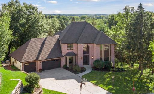 Nestled and set perfectly for rear sightlines to the evergreens and front sightlines to the landscaped interior feature of the culdesac