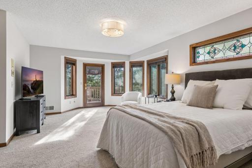Upper level spacious primary bedroom suite