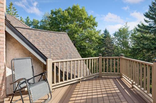 Primary bedroom suite private balcony overlooking the evergreens - perfect for early mornings or to watch the stars at night