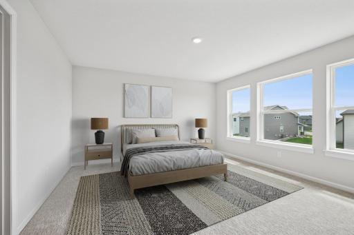 Virtually staged owner's retreat. Photo of previously built Degan plan. Colors and selections will vary.